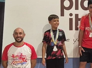 David Rodriguez with the neck medal